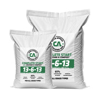 Two bags of Curb Appeal complete start premium lawn starter fertilizer with labels on a white background